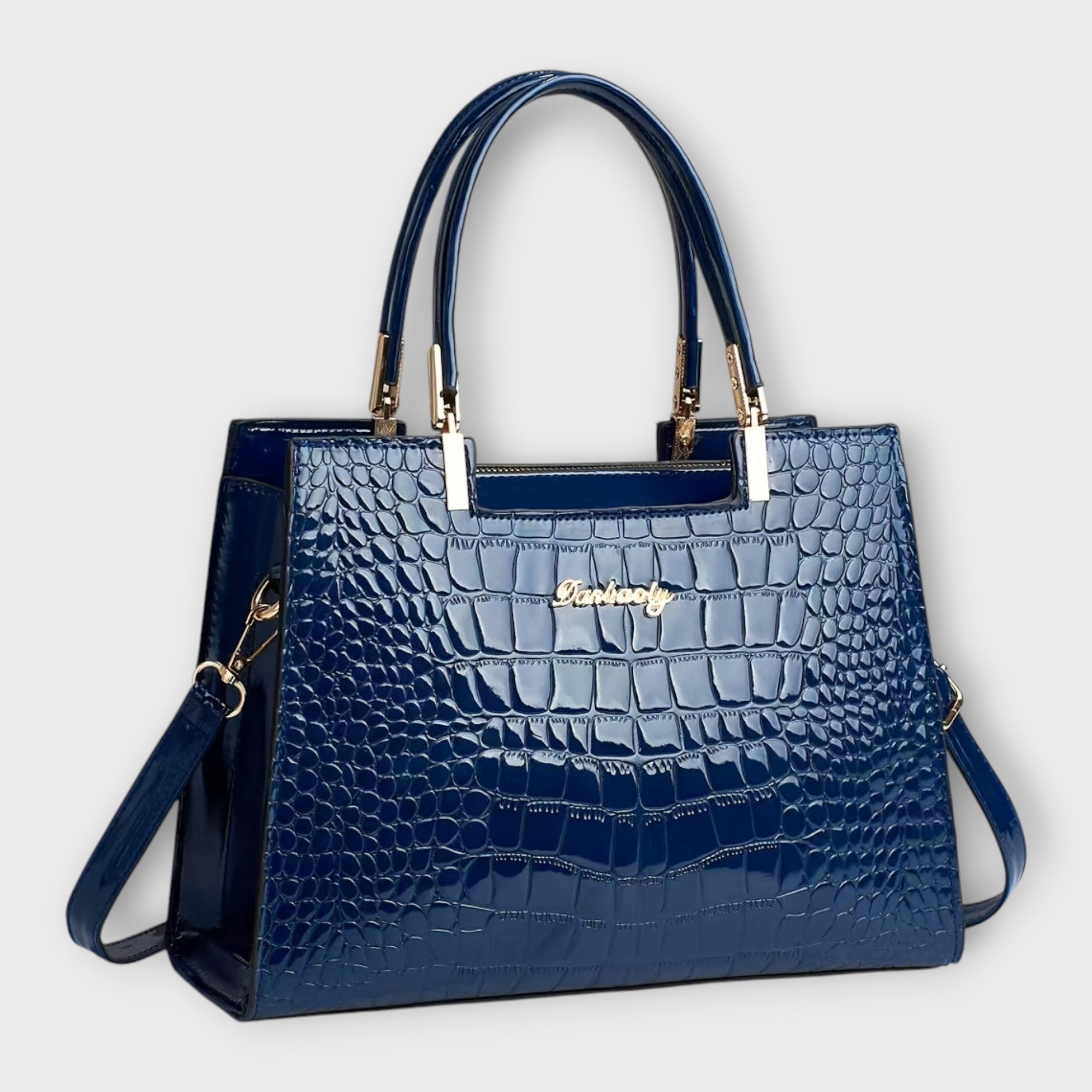 Lora. - Sac à main en cuir verni à motif crocodile