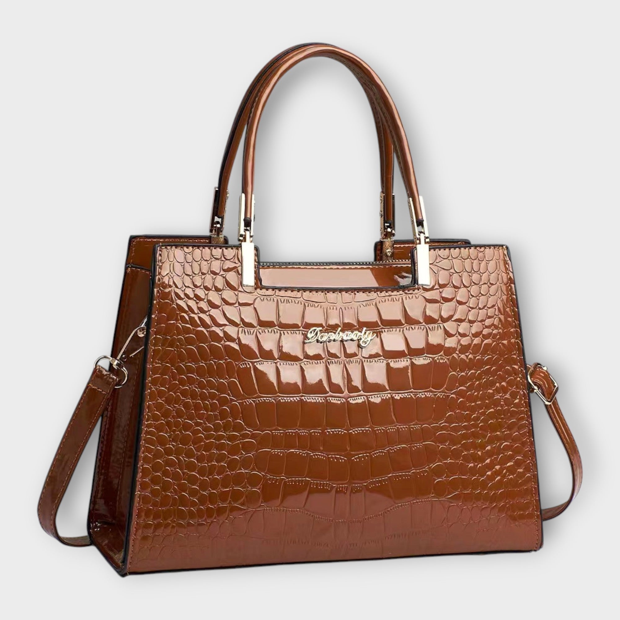 Lora. - Sac à main en cuir verni à motif crocodile