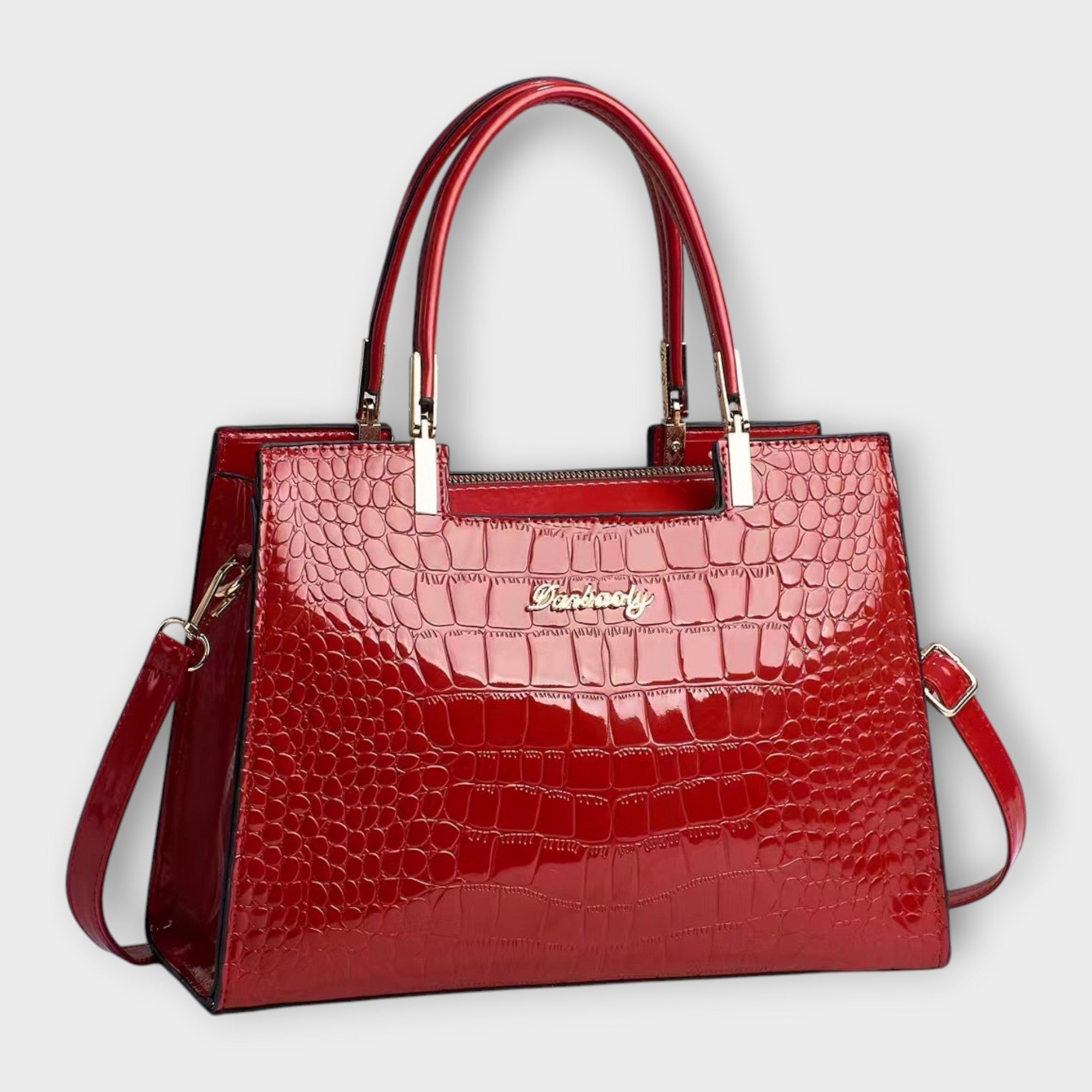 Lora. - Sac à main en cuir verni à motif crocodile
